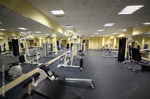 Light big gym with many equipment for bodybuilding at the rehabilitation center.
