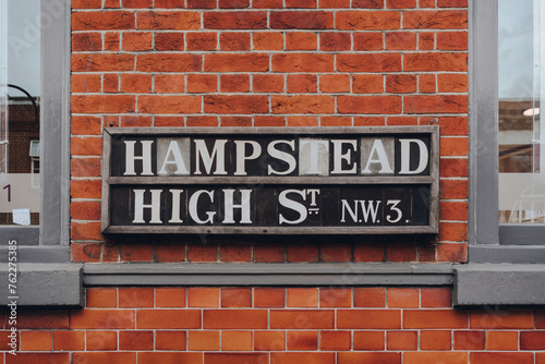 Street name sign on a building on Hampstead High Street, London, UK. photo