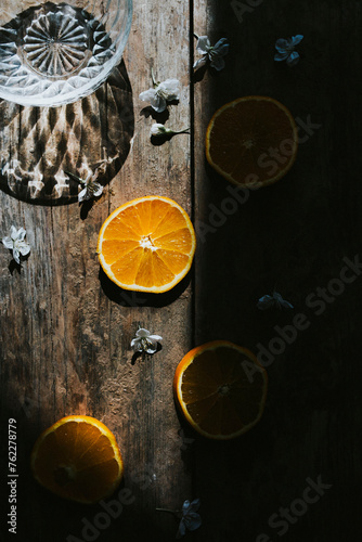 Still life with cut up oranges in the sun