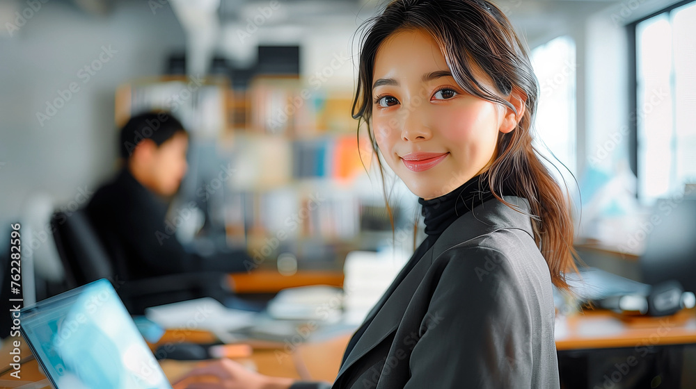 cute asian girl with laptop working in modern office cute asian girl with laptop working in modern office