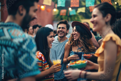 Close-up of attendees at a lively Mexican party