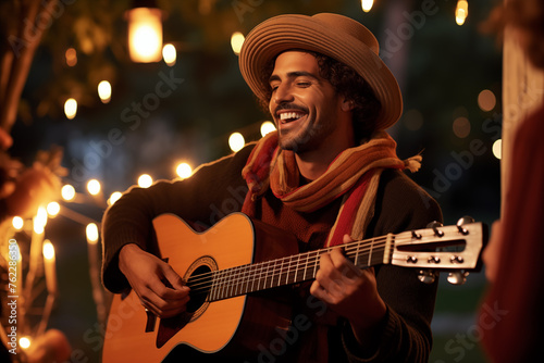 Happy mexican man in hat playing guitar during holiday outdoors, generative AI