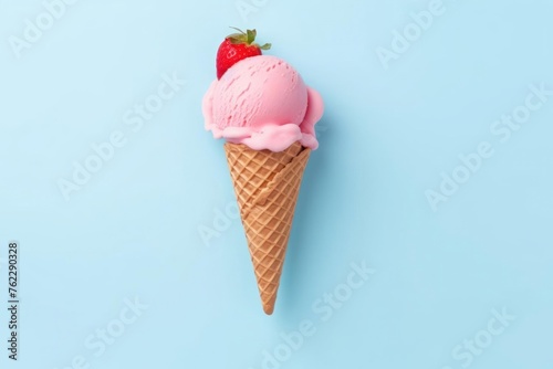 Pink strawberry ice cream on a pastel blue background