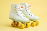 Roller skates and daisies on a pastel background. Copy space. Minimalist style.