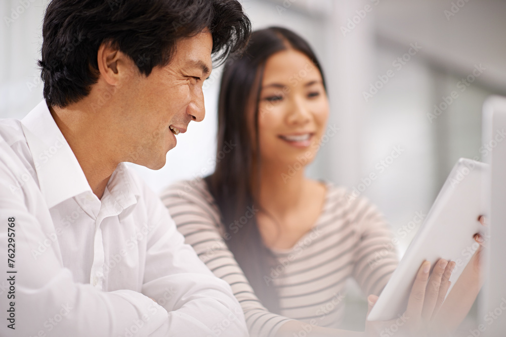 Obraz premium Work, cooperation and people with tablet for collaboration in Japanese startup with teamwork. Planning, project and happy in Tokyo office and reading online research with discussion of feedback