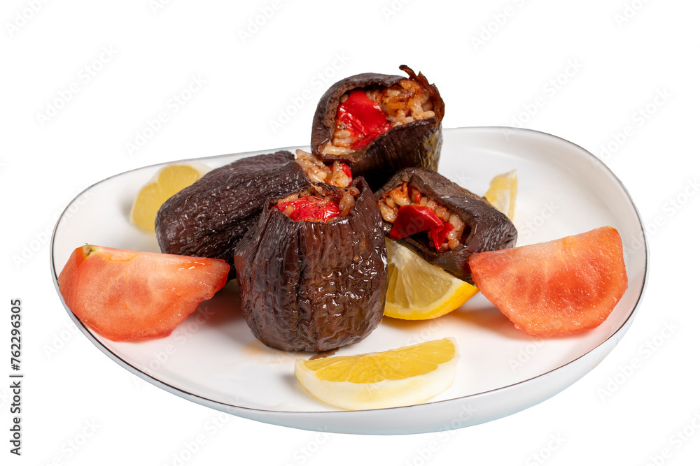 Eggplant stuffed with rice. Appetizer dishes. Stuffed eggplant with olive oil isolated on white background. local name patlican dolması Eggplant stuffed with rice. Appetizer dishes. Stuffed eggplant with olive oil isolated on white background. local name patlican dolması