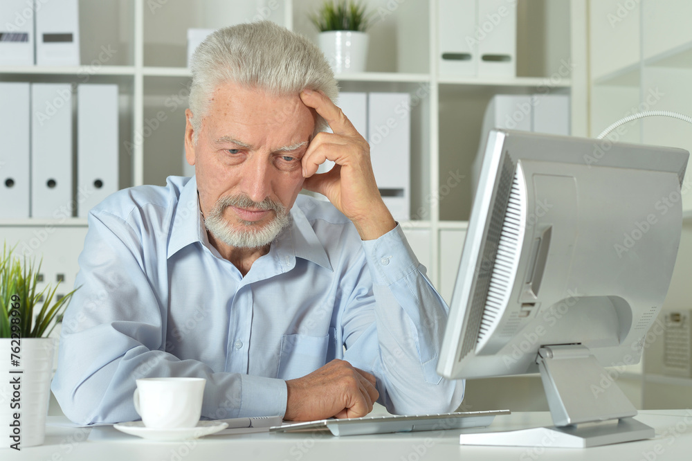 Close up portrait of thoughtful senior businessman Close up portrait of thoughtful senior businessman