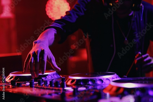 Dj mixing at night club party, Dj mixer close up, nightlife view of disco club, entertainment and fest concept