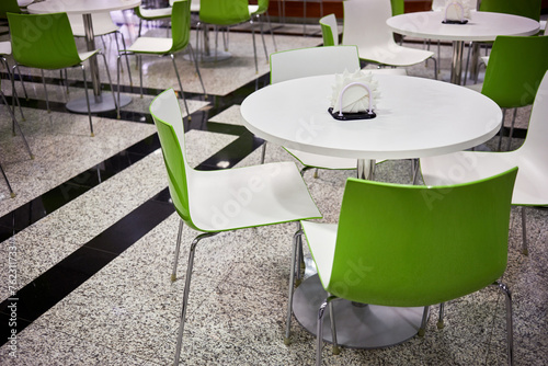 Interior of cafe with light plastic furniture. photo