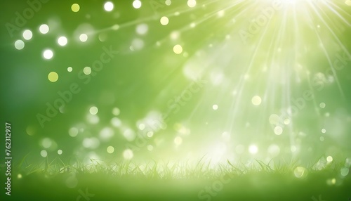 An abstract background with bright lights and bokeh effects. Green and white hues