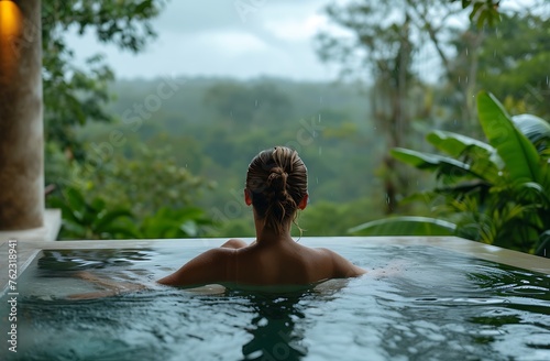 Enveloped by the Rainforest: Woman Serenity in an Outdoor Pool, a Moody and Atmospheric Composition