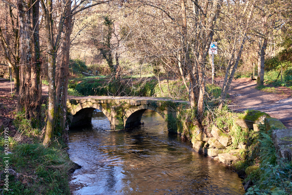 The medieval Sardoma bridge that crosses the Lagares River in Vigo, Spain The medieval Sardoma bridge that crosses the Lagares River in Vigo, Spain