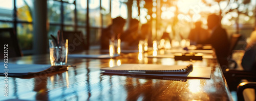 Business people at work in a busy luxury office space background blurred