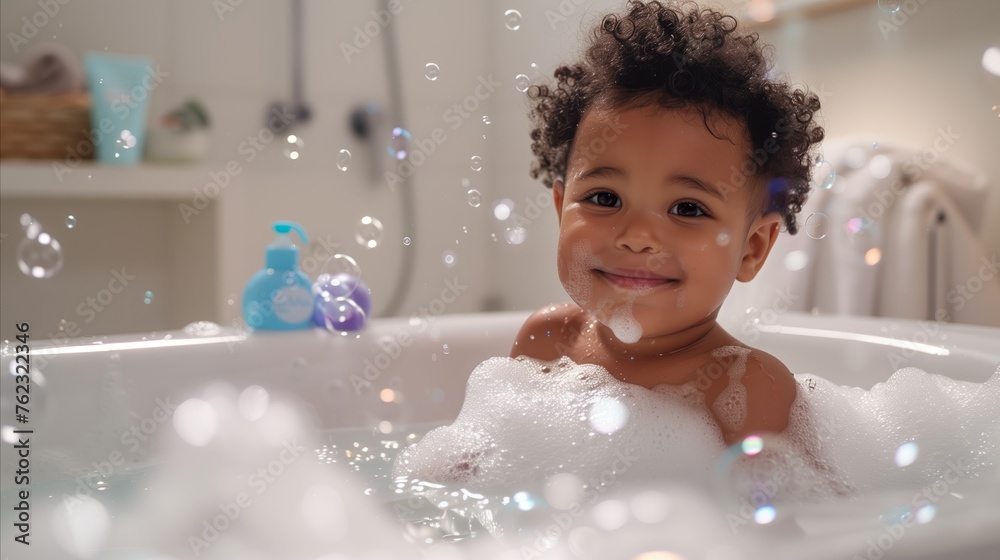 Cheerful toddler enjoying a bubble bath with floating soap bubbles Cheerful toddler enjoying a bubble bath with floating soap bubbles