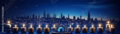 Cityscape with Menorah at night in blue and gold colors, 3d illustration photo