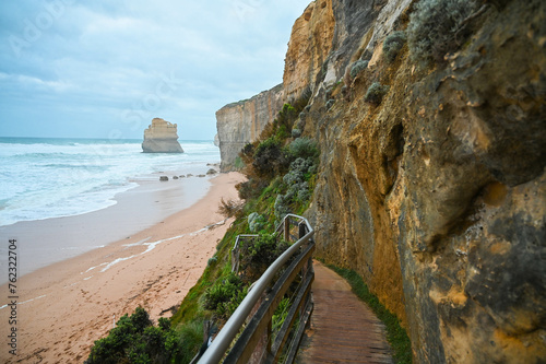 Sandy beach with big waves at the Twelve Apostles, Great Ocean Road, Australia
