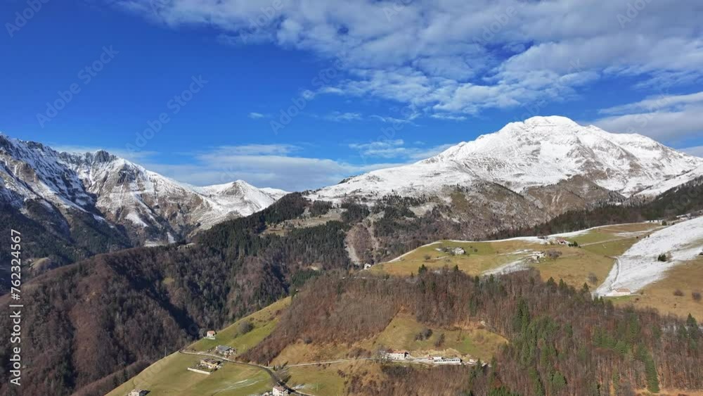 Aerial view of Riso valley and Zambla town,background Orobie alps, Lombardy, Italy Aerial view of Riso valley and Zambla town,background Orobie alps, Lombardy, Italy