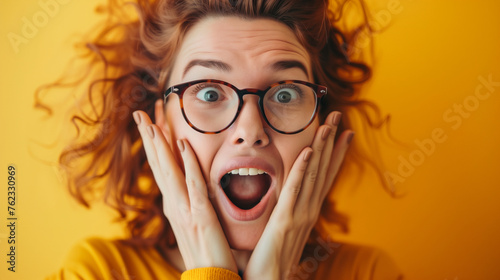 woman wear glasses make really suprised but happy face
