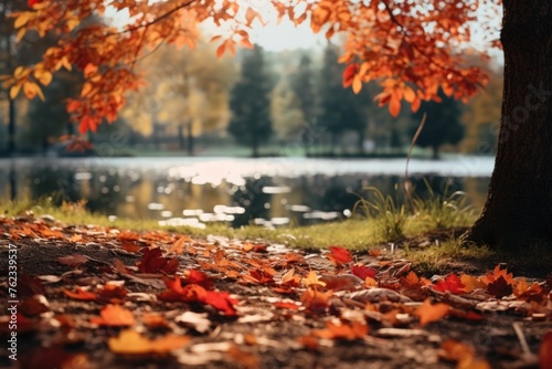 Fallen leaves scattered on the ground by the water  ideal for nature and autumn themed projects