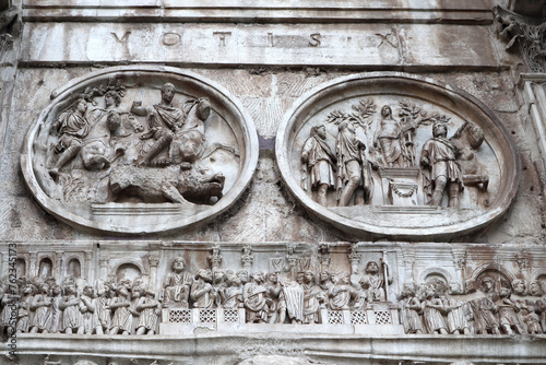Fragment of Arch of Constantine in Rome, Italy photo