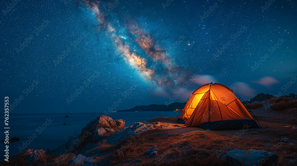 Beautiful night landscape with a wooden house on the top of the mountain. Camping on the beach. Night sky with stars and milky way. Beautiful night landscape with a wooden house on the top of the mountain. Camping on the beach. Night sky with stars and milky way.