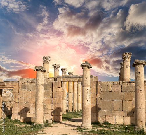 Roman ruins (against the background of a beautiful sky with clouds) in the Jordanian city of Jerash (Gerasa of Antiquity), capital and largest city of Jerash Governorate, Jordan
