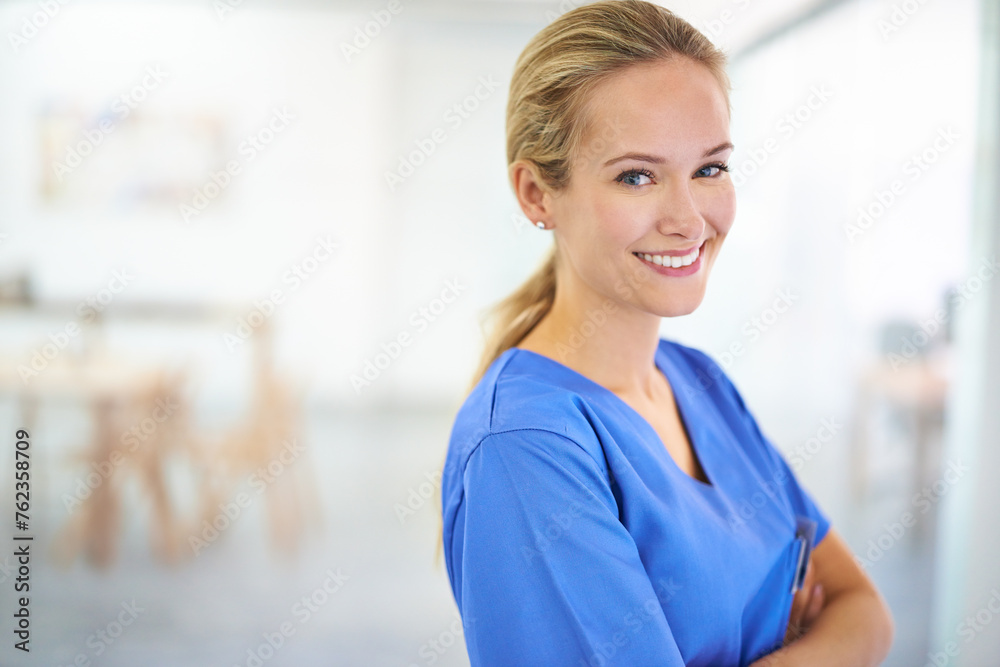 Nurse, arms crossed or portrait of a happy woman in hospital for medical, support or mockup space. Smile, healthcare and confident female surgeon nursing in clinic for wellness, medicine or treatment Nurse, arms crossed or portrait of a happy woman in hospital for medical, support or mockup space. Smile, healthcare and confident female surgeon nursing in clinic for wellness, medicine or treatment