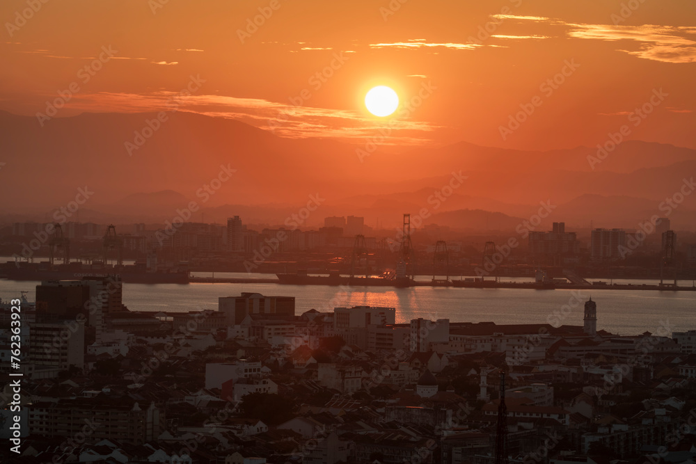 penang malaysia 14th mar 2024: the view of sunrise in the George town. It was the first British settlement in Southeast Asia and be a UNESCO World Heritage Site since 2008. penang malaysia 14th mar 2024: the view of sunrise in the George town. It was the first British settlement in Southeast Asia and be a UNESCO World Heritage Site since 2008.