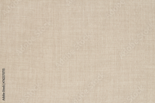 Brown linen fabric cloth texture for background, natural textile pattern.