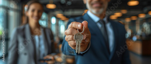 housekeys being handed over, concept photography photo