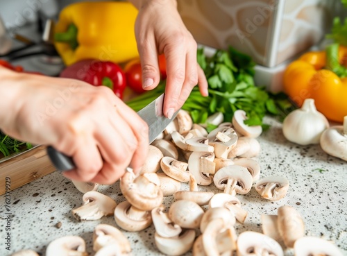 A woman's hands using a knife to cut mushrooms on a wooden board with vegetable stock in the style of photo, high quality detailed photography.