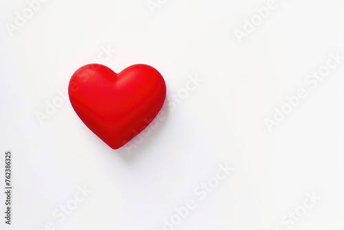 A red heart on white background with copy space  Valentine s day and love concept