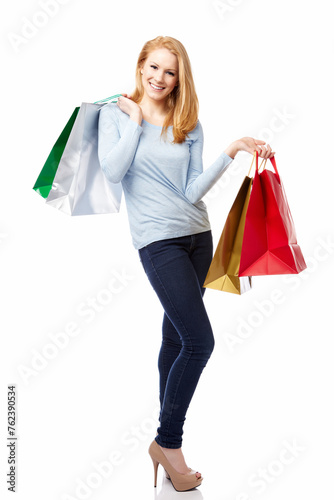Smiling Young Woman with Shopping Bags