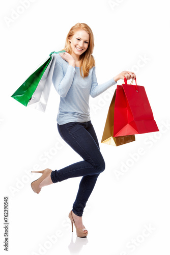 Smiling Young Woman with Shopping Bags