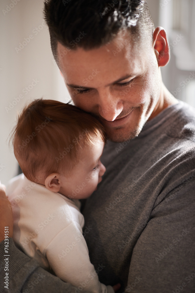 Father, baby and smile with hug for bonding, love and happiness with child development and parenting. Peace, calm and childhood with connection, man and newborn kid for tender moment at family home Father, baby and smile with hug for bonding, love and happiness with child development and parenting. Peace, calm and childhood with connection, man and newborn kid for tender moment at family home