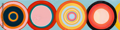 Minimalistic concentric circles in varying sizes create a harmonious visual rhythm. The absence of clutter allows the viewer to focus on the interplay of colors. photo