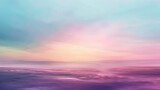 An abstract portrayal of a serene sunset over the ocean, blending vibrant shades of pink and blue across the horizon.