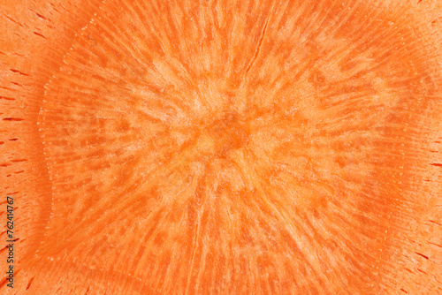 Macro background, carrots in the section. Vegetables in closeup.