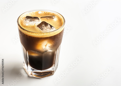 Aerocano is a trend cold coffee in a glass with ice cubes on white background, copy space