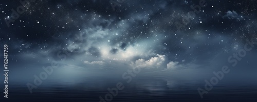 A black sky silver background light water and stars