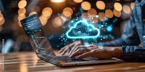 CTO utilizes cloud computing services to monitor data center operations via laptop. Concept Cloud Computing, Data Center Operations, CTO, Laptop Monitoring, Technology