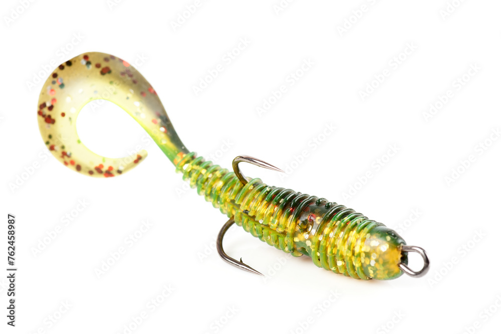 Soft fishing bait for predatory fish, moss green plastic grub, with double hook, isolated on white Soft fishing bait for predatory fish, moss green plastic grub, with double hook, isolated on white