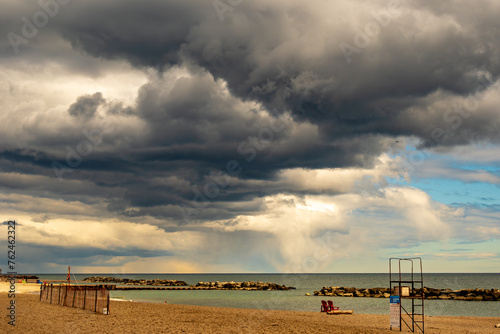 Photography dramatic clouds over  balmy beach toronto shot in march room for text