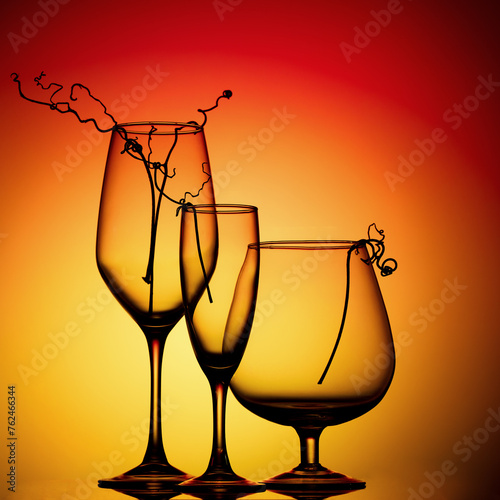 Still life with glass objects on a multicolored background