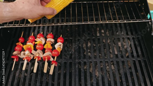 Grilling skewers of food on a grill for a delicious barbecue dish