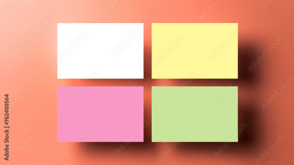 Fototapeta premium Organized stack of colored sticky notes on a gradient orange background with shadows