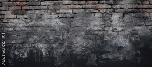 A closeup shot of a grey brick wall emitting smoke  highlighting the intricate brickwork pattern. Monochrome photography captures the texture in the darkness