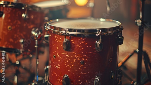 Drummer's perspective of a vibrant red drum kit ready for a live session photo