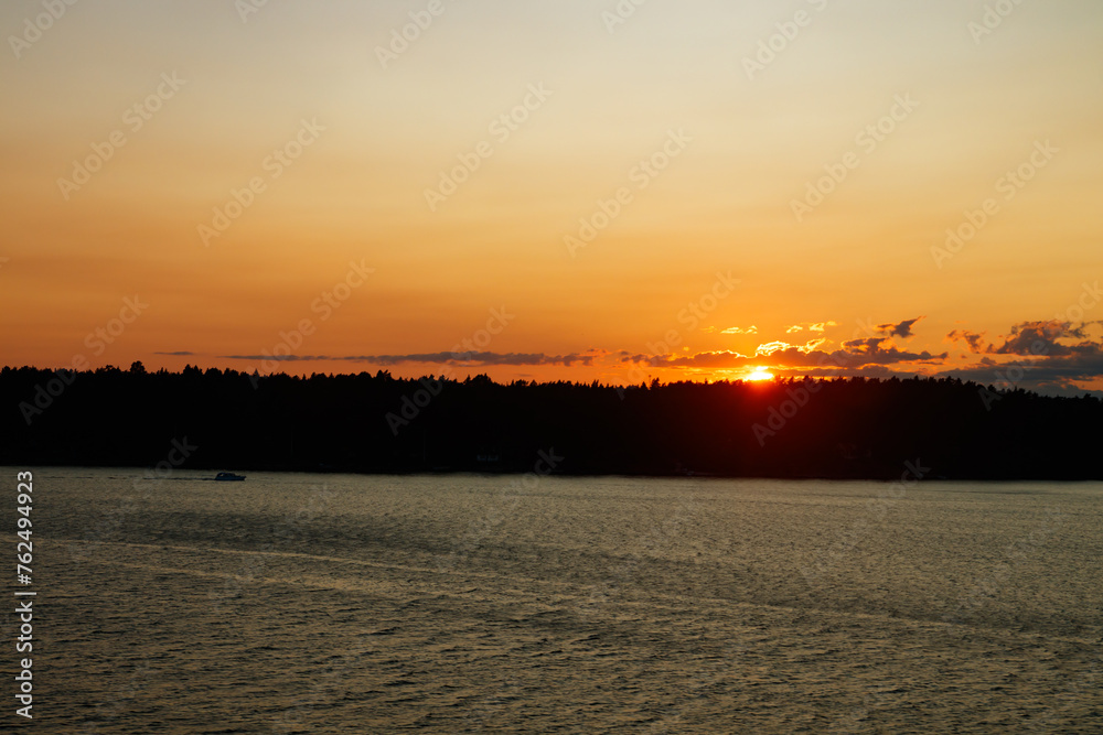 Magical sunset over the Gulf of Finland, Baltic sea. View from the ship