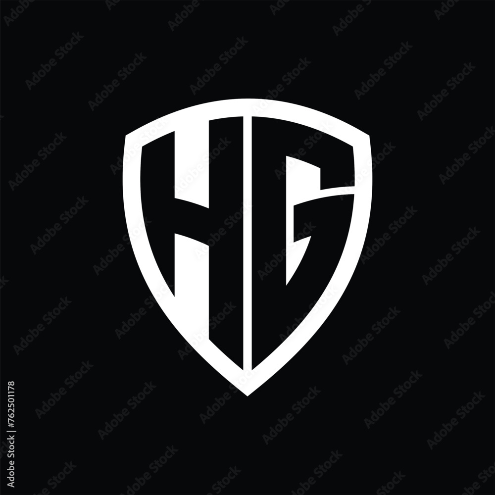 HG monogram logo with bold letters shield shape with black and white color design HG monogram logo with bold letters shield shape with black and white color design